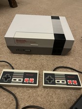 Nintendo NES Grey Console with Power/Av Cables and 2 Control Pads + Super Mario3