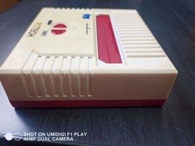 Family Computer (Famicom) compatible console + 13 game cartridges