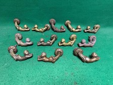 maniglie porta porte ottone antico epoca scolpite bambino forse alcune in bronzo