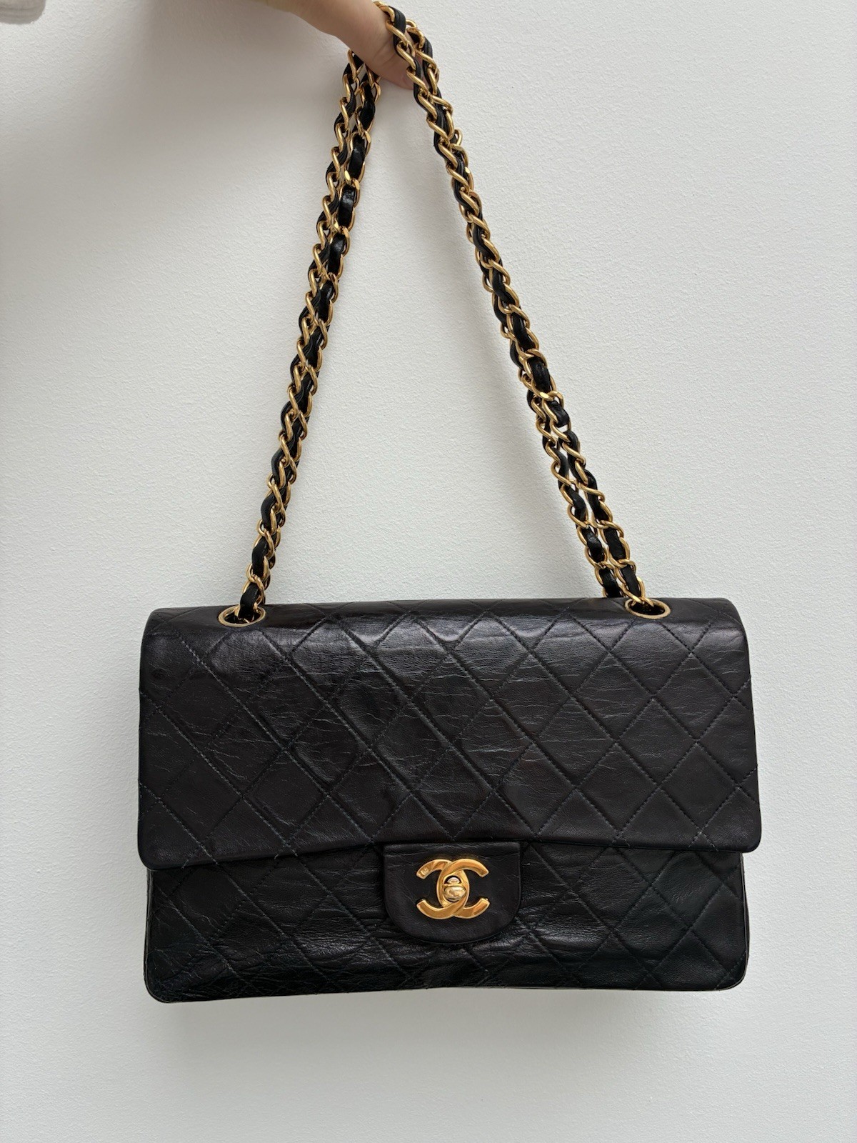 Vintage Chanel Classic Double Flap in black lambskin with gold hardware
