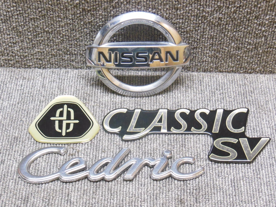 Capó delantero Nissan Cedric Y34 Infiniti M45 emblema cromado plateado JDM OEM Foto 3 de 4