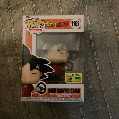 Funko Pop! Vinyl: Dragon Ball - Goku (Driving Exam) - OFFICIAL 2022 COMIC CON