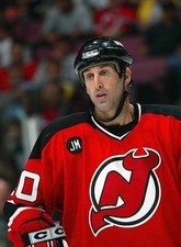 Jay Pandolfo New Jersey Devils looks on at a break in action- Ice Hockey Photo