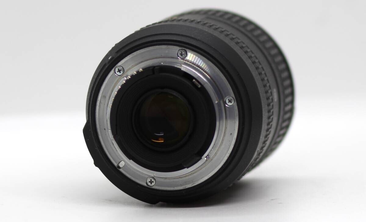 NIKON Nikon AF-S DX NIKKOR 16-85mm F3.5-5.6 G ED VR with front and