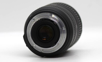 NIKON Nikon AF-S DX NIKKOR 16-85mm F3.5-5.6 G ED VR with front and