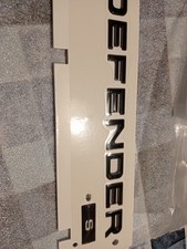 LE137288 SCRITTA DEFENDER NERO LUCIDO POSTERIORE LAND ROVER