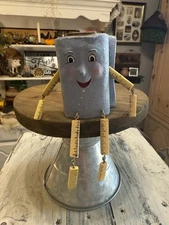 WMG 06’ Brown Anthropomorphic Face Figure Bolt Of Fabric Shelf Sitter Figurine