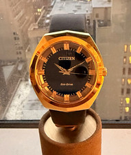 Imagen de Citizen Eco-Drive Men's Gold Tone Black Dial Leather Strap Date Watch
