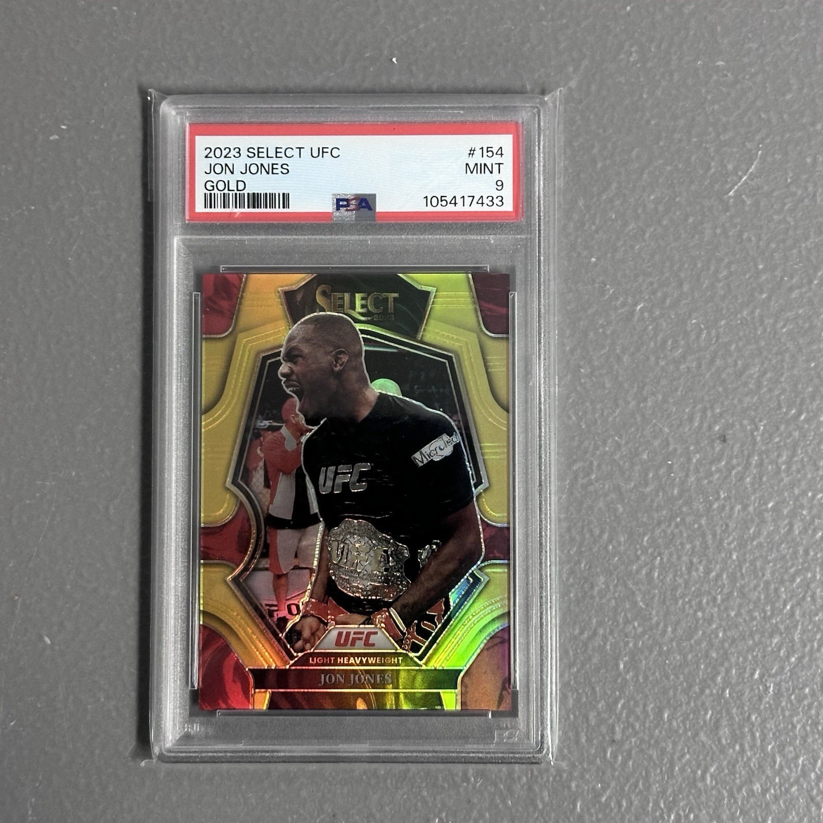 2023 Panini Select UFC Jon Jones Premier Level /10 Gold Prizm PSA 9 MINT view 5