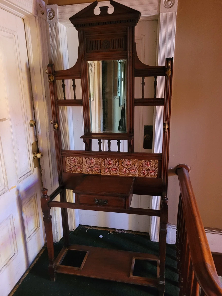 Antique hall tree with online mirror and umbrella stand