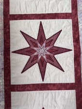 Handmade quilted table runner/red/stars