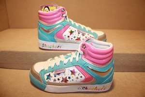 girls skechers high tops