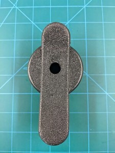 Tippmann "modern" 9oz butt plate.  See photos for measurement.  