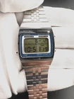 Seiko A229-5000 Vintage 1970s LCD Chronograph Quartz Watch 34mm Blue Bezel Stand
