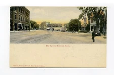 Andover MA postcard man crossing wide dirt street Elm Square, men on bench to rt