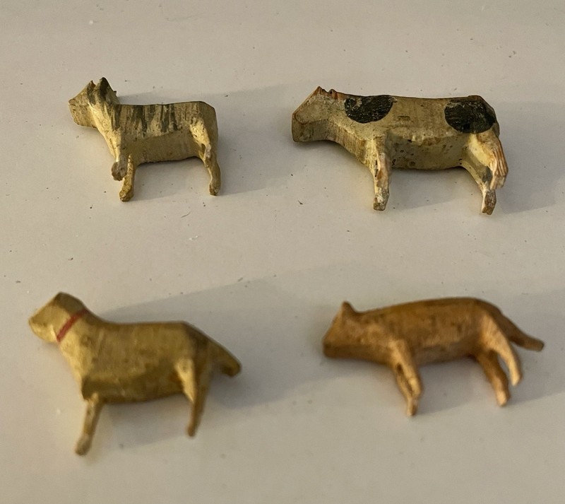 Four German Erzgebirge hand-carved wooden miniature animals
