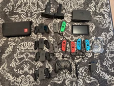 Nintendo Switch HAC-001 - 7 Joycons, 4 Grips, Dock, Pro Controller, 2 Chargers +