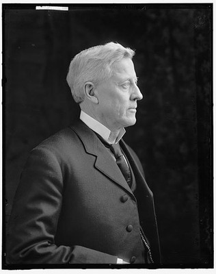 Photo:Hon. J.W. Alexander Portrait Profile Black Suit
