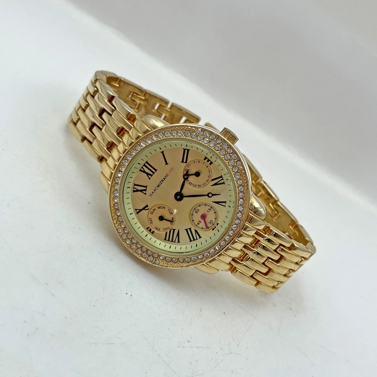 Isaac Mizrahi Gold Tone Watch with White Dial and Black Roman Numerals Isaac Mizrahi Live Watch White Buckle Band Gold Tone Round  main image 3