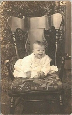 RPPC Studio Pose Baby Sitting in Large Ornate Chair early 1900s