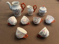 Vintage 9-Piece Orange  White Miniature Porcelain Tea Set w/Floral design .