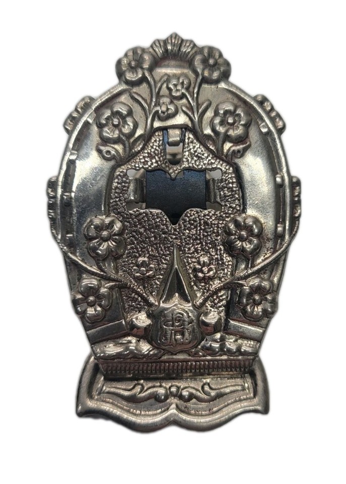 Ornate Victorian brass paper clip with silver wash from circa 1900 — a tiny, exquisite piece of functional desk history you'd never find at a big-box store.
