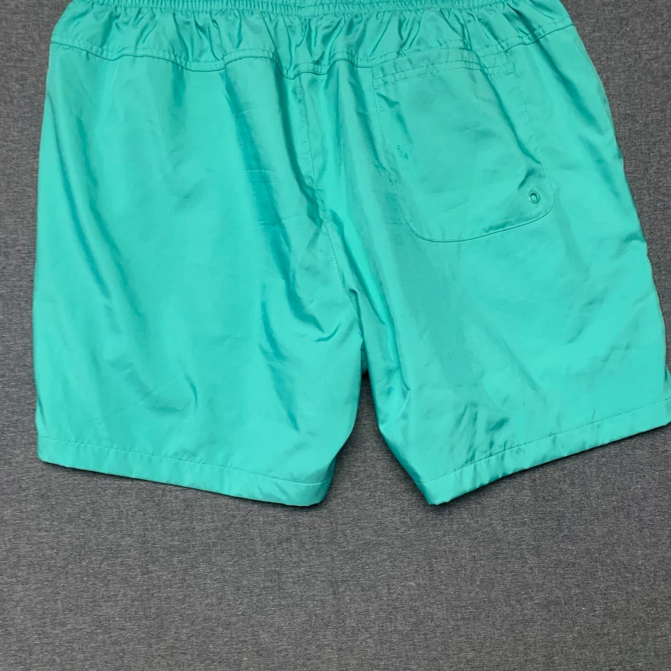 Pantalones cortos de natación forrados de malla con cordón verde azulado talla XL de secado rápido Nike para hombre Foto 3 de 4