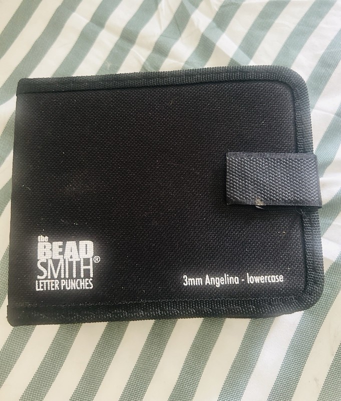 The bead smith Upper & Lower Case Alphabet Metal Stamps Bonus Punctuation Set