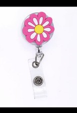 pink flower badge reel