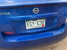 10-12 Sentra License Plate Trim Surround Panel Oem Tail Trunk Finish Blue B17 10-12 Sentra License Plate Trim Surround Panel Oem Tail Trunk Finish Blue B17