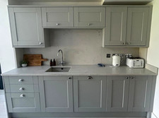 Howdens Dove Grey kitchen cupboard doors and silver handles. Hinges not included