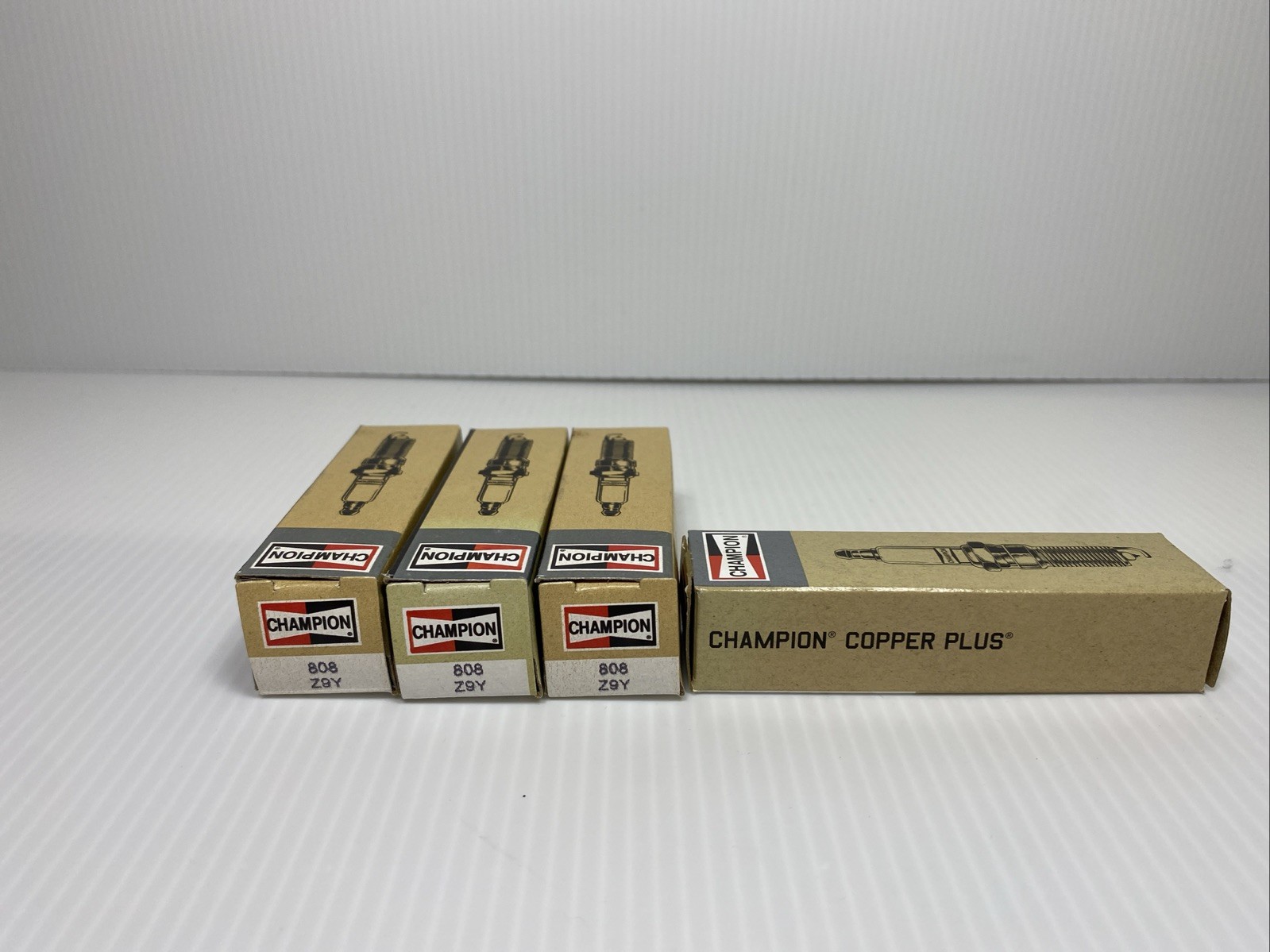 Lot of 4 Champion Copper Plus Spark Plugs 808 Z9Y Different Boxes      Lot C