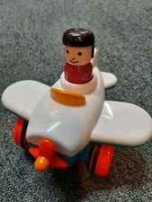 Battat Push & Go Airplane Toy with fixed pilot figure. Used in good condition