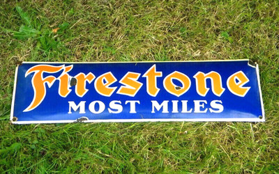 LARGE FIRESTONE MOST MILES VTG PORCELAIN METAL SIGN 27-1/2''x 7-3/4'' TIRES RACING