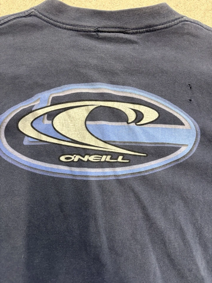 Camiseta vintage anos 90 O'Neill azul marinho logotipo onda surfista algodão feita nos EUA tamanho G - Imagem 3 de 4