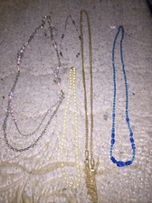 Lot of five vintage necklaces one has $32 price tag on it