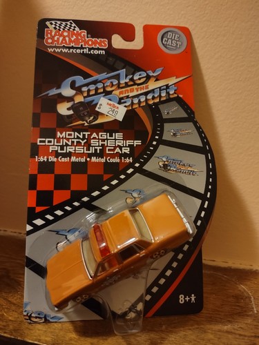 RACING CHAMPIONS - SMOKEY AND THE BANDIT 1977 PONTIAC Le Mans Police Car- 1/64