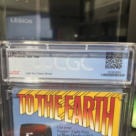 To The Earth (NES) CGC 8.5 B and Orange Zapper &ndash; Alien Blaster Bundle!