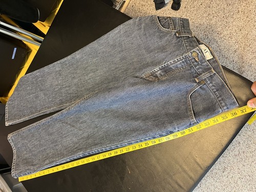 AX Armani Exchange J40 women’s blue short regular bootleg jeans with yellow measuring tape across the waistband.