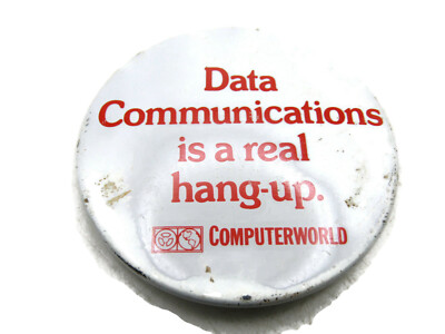 Computer World Button Data Communications Is A Real Hang-Up.