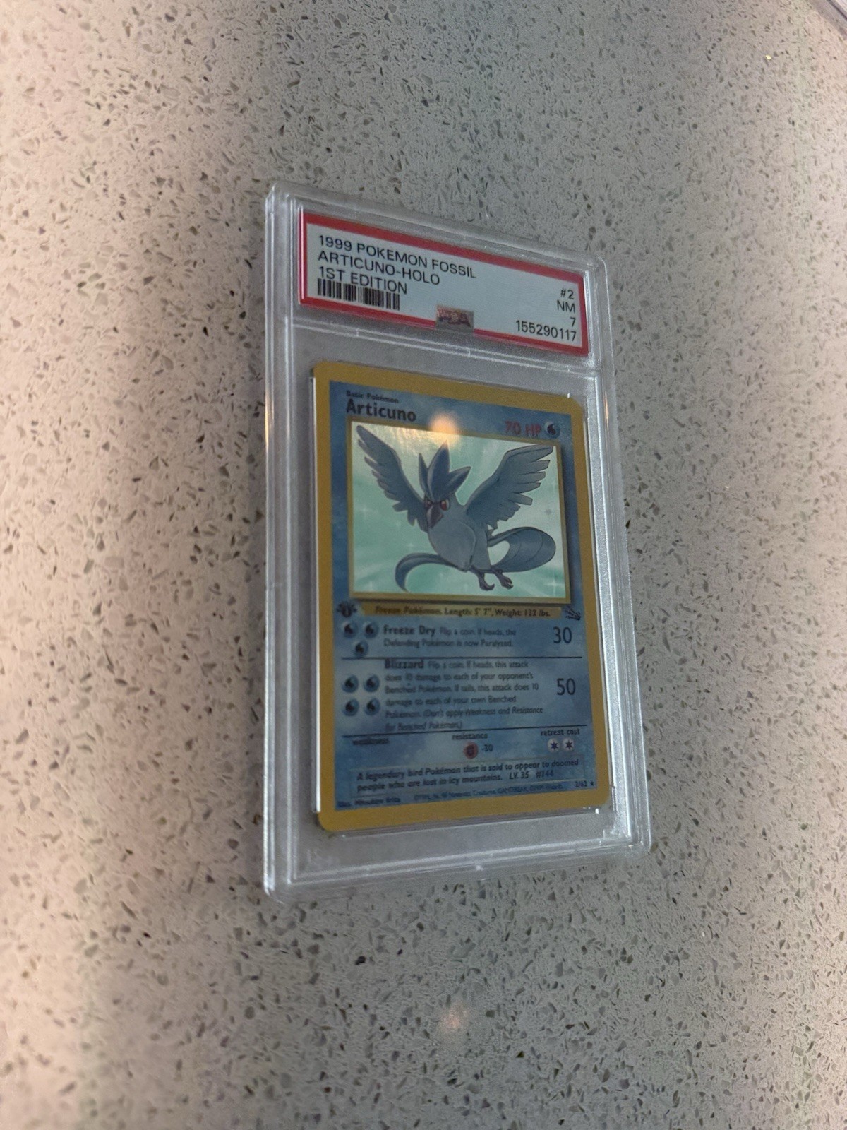 1999 POKEMON FOSSIL 2 ARTICUNO-HOLO 1ST EDITION - PSA 7 view 2