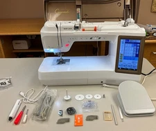 Baby Lock Crescendo sewing and quilting machine with low usage