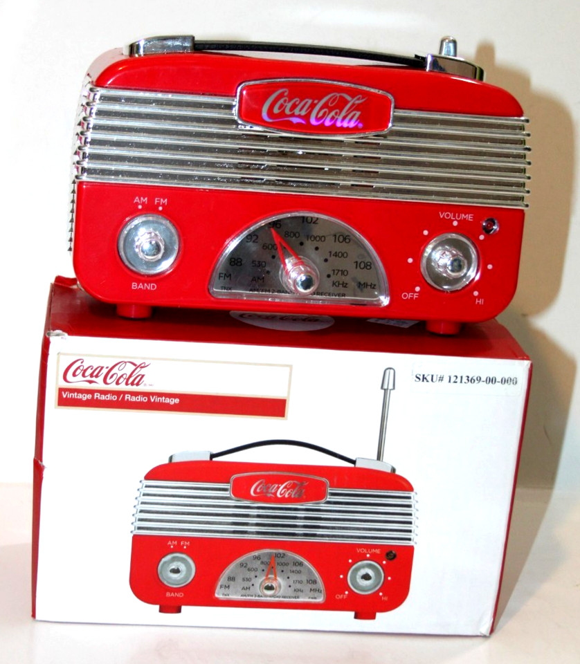 A working AM/FM radio dressed up as a vintage Coca-Cola vending machine — functional kitsch that looks great on a shelf.