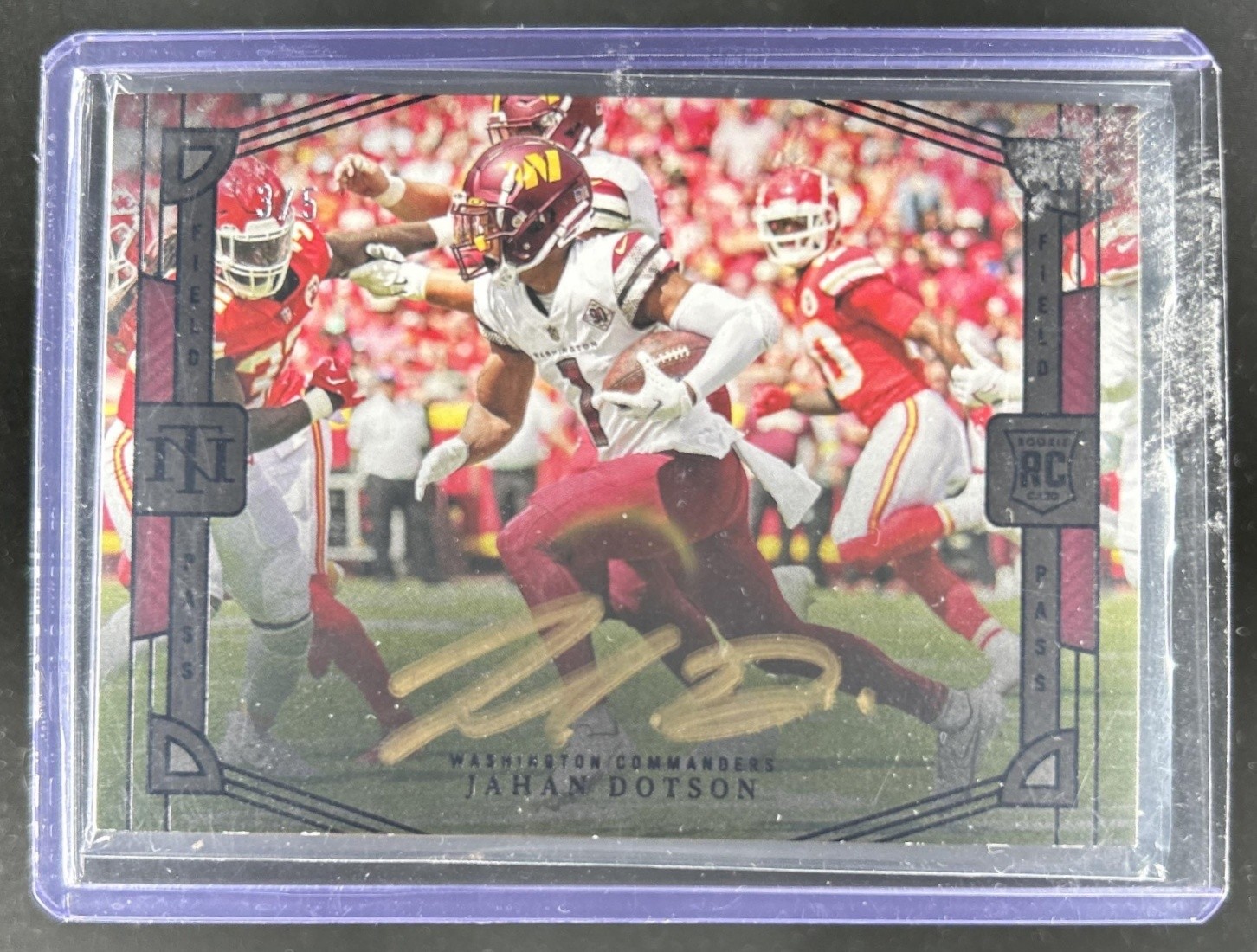 2022 Panini National Treasures Jahan Dotson Rookie Field Pass RC Black Auto #/5 view 1