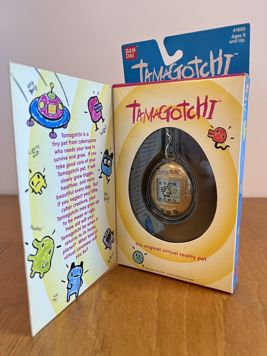 Original 1997 Tamagotchi #1805 Gold, Black Buttons, Original Box