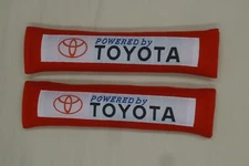 2x New Red Car Seat Belt Cover Shoulder Pads "Powered by Toyota" 10.5"x2.5"