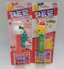 Lot Of Two Christmas Pez - Happy Holidays Pikachu & Hello Kitty With Green Bow