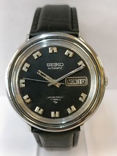 VINTAGE SEIKO AUTOMATICO 17J PATINA QUADRANTE NERO 7006-8070 JAPAN UOMO FUNZIONANTE