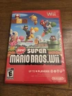 Nintendo New Super Mario Bros. Wii CIB w/ Manual NTSC-U/C 2009 E - Tested
