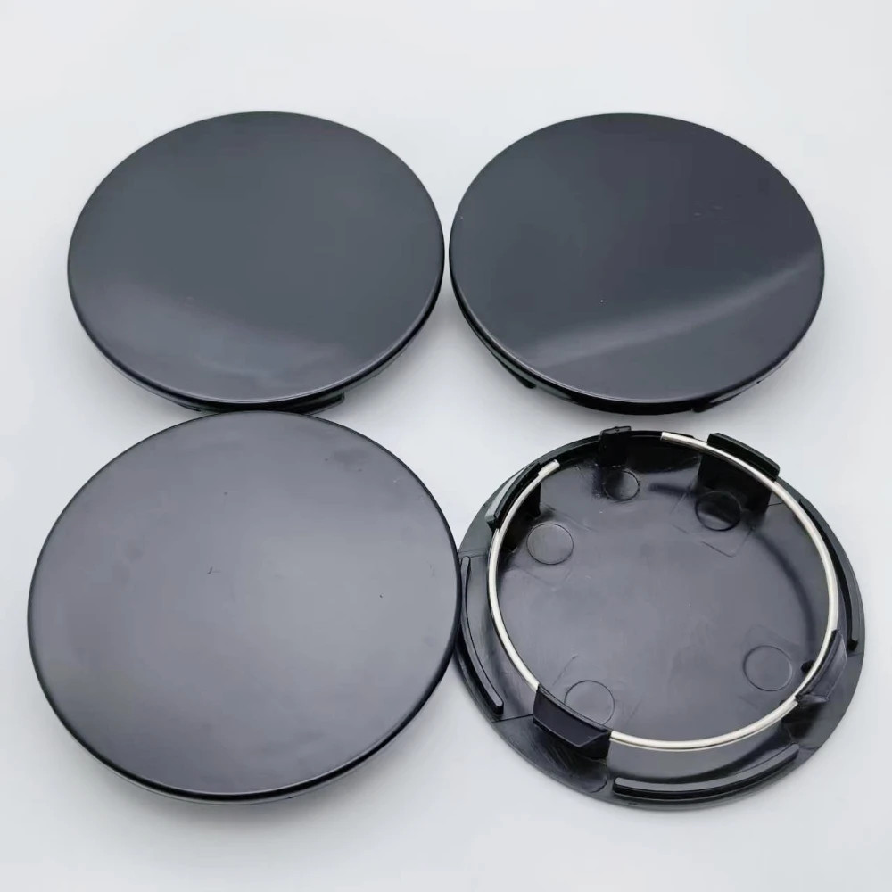 4x 70mm AD/60mm ID nero coprimozzo emblema coprimozzo copricerchio copriruota